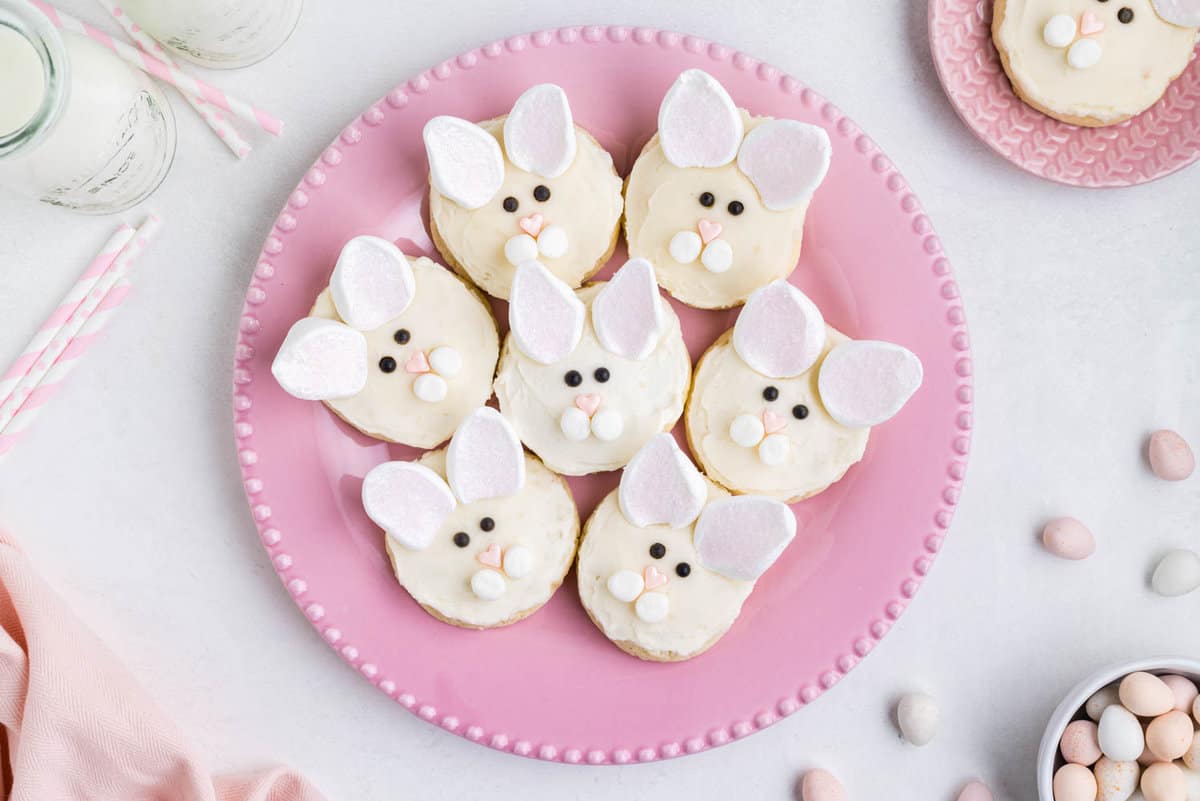Pink plate filled with Bunny Face Cookies.