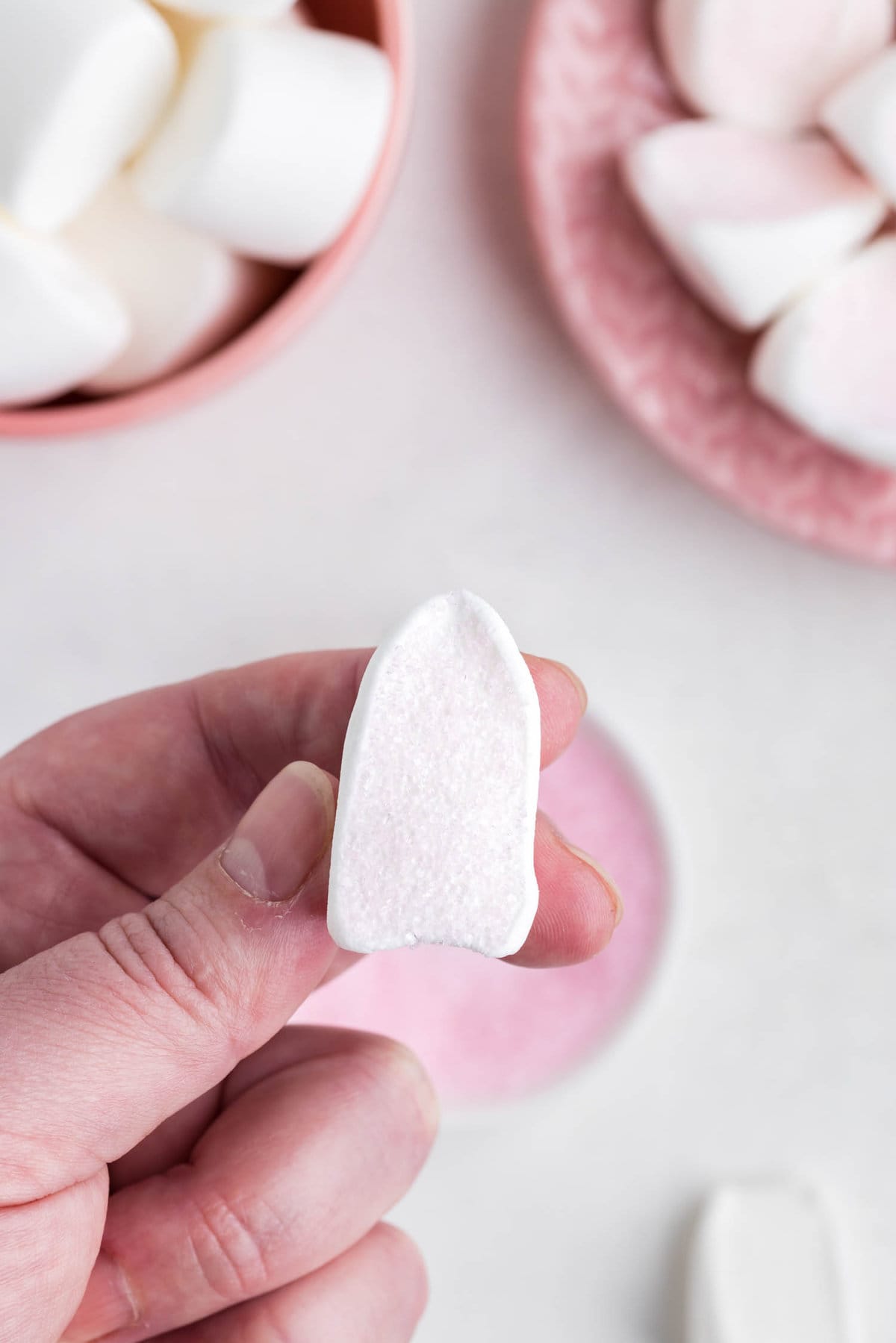 Large marshmallow dipped into pink sugar.