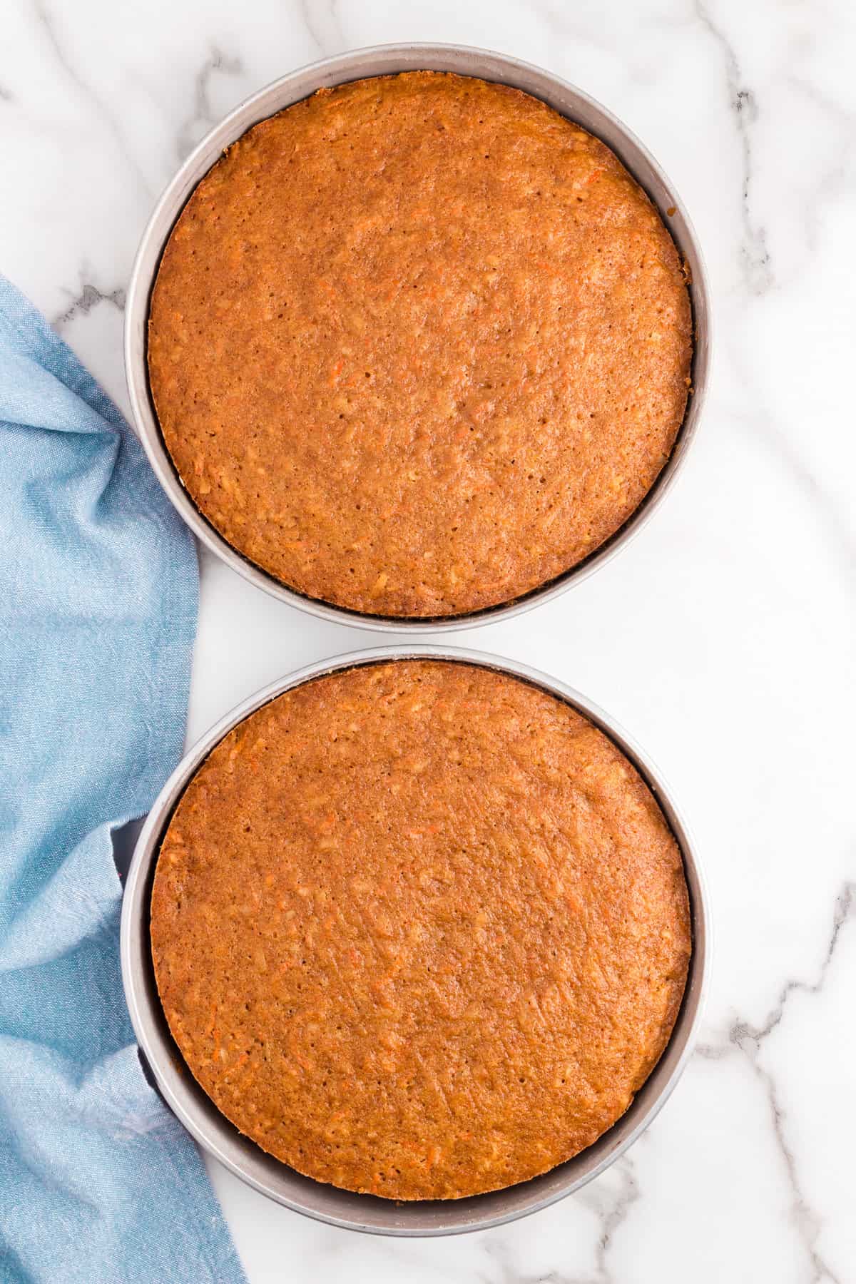 Carrot Cake baked to golden brown in two round cake pans