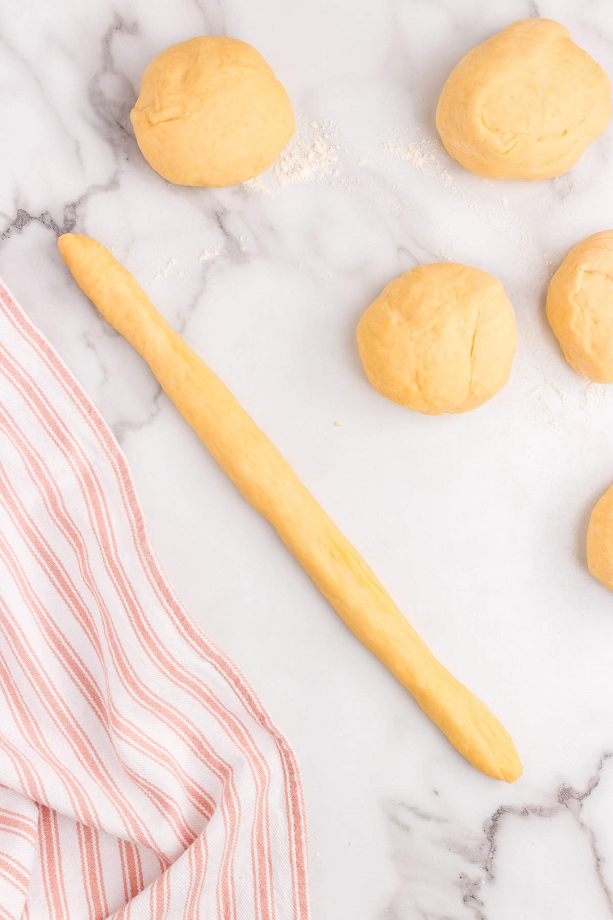 Pulling Easter Bread dough into strips