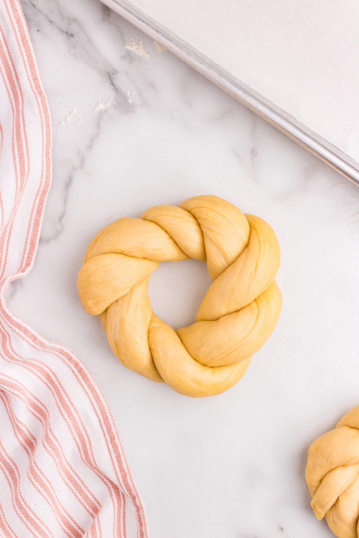 Twisting Easter Bread dough into wreath shape