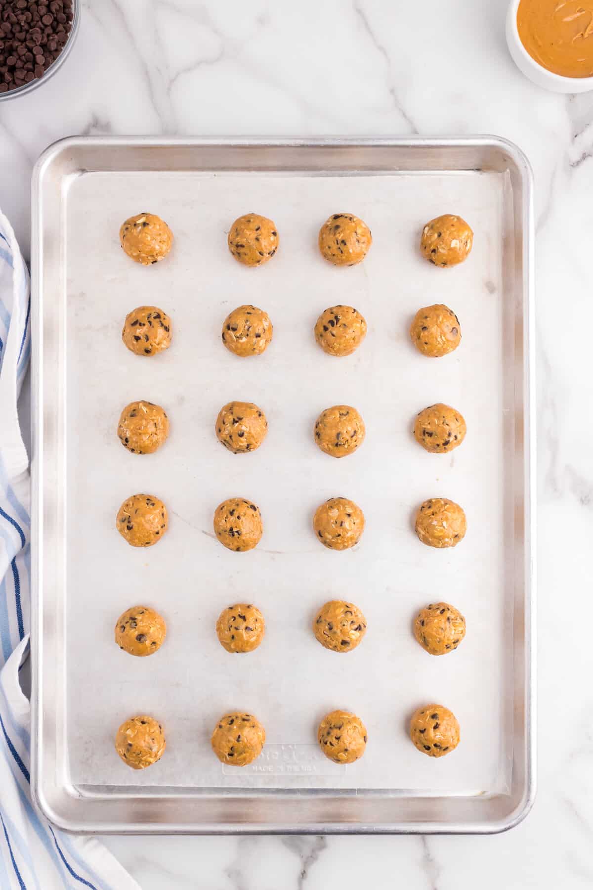 place on a cookie sheet with parchment paper to put into the fridge.