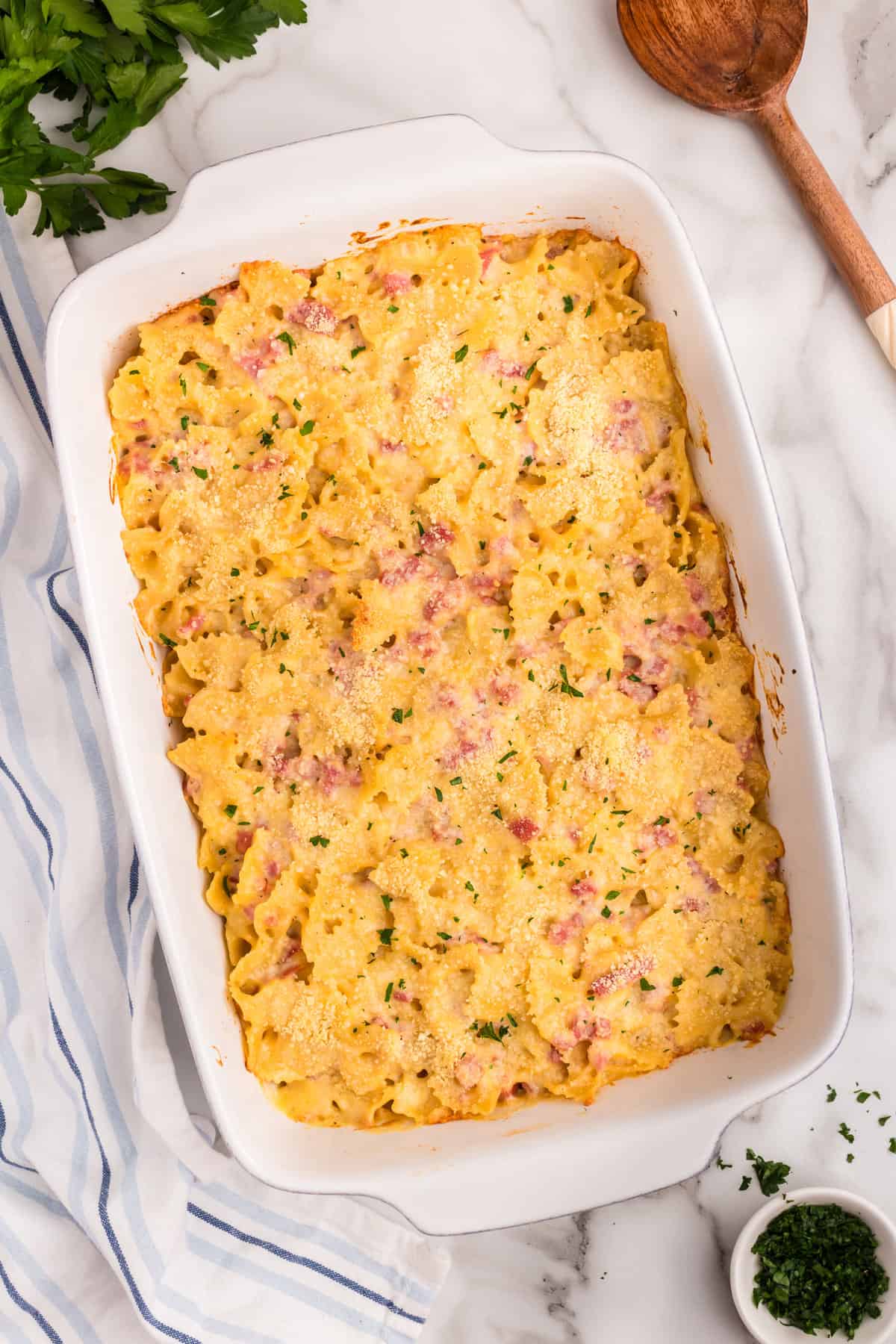 Cheesy Ham Casserole baked to a golden brown in 9x13 baking dish