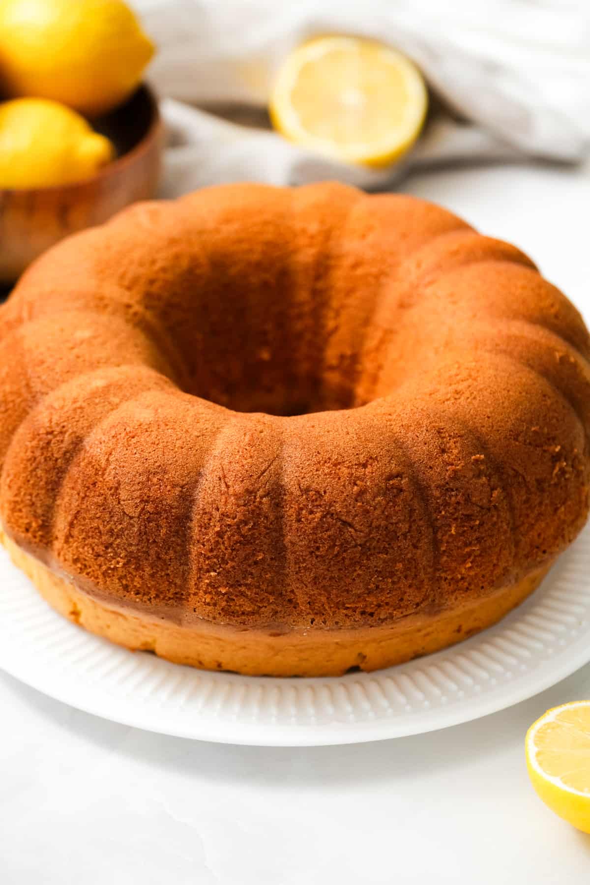 Lemon Bundt Cake using cake mix on plate unfrosted