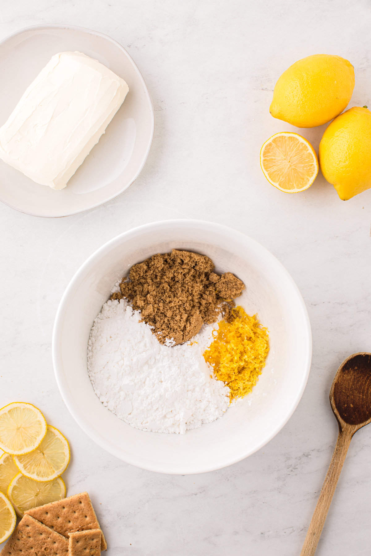 Ingredients for Lemon Cheesecake in mixing bowl