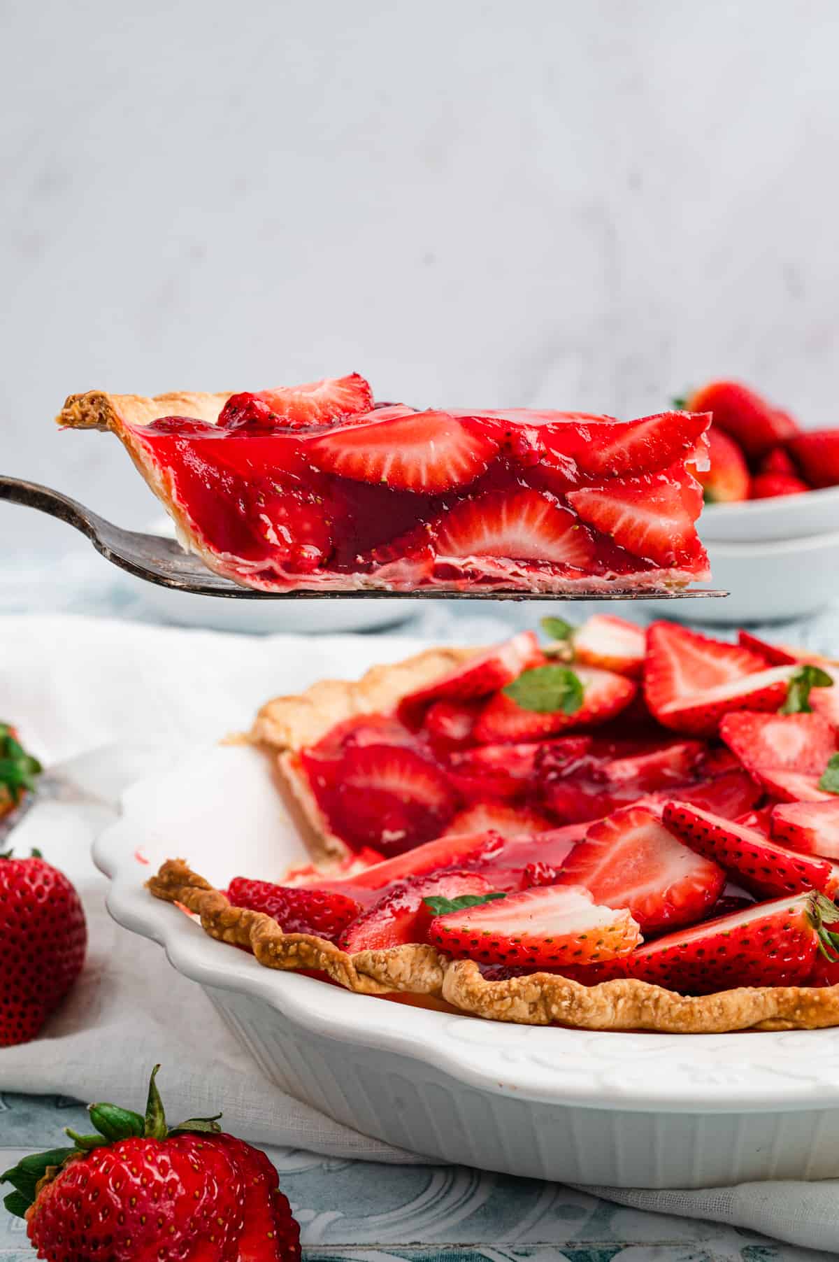 Slice of Strawberry Pie using serving spoon