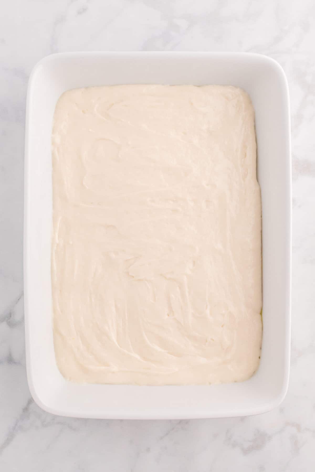 Pour two cups of batter into prepped cake pan.