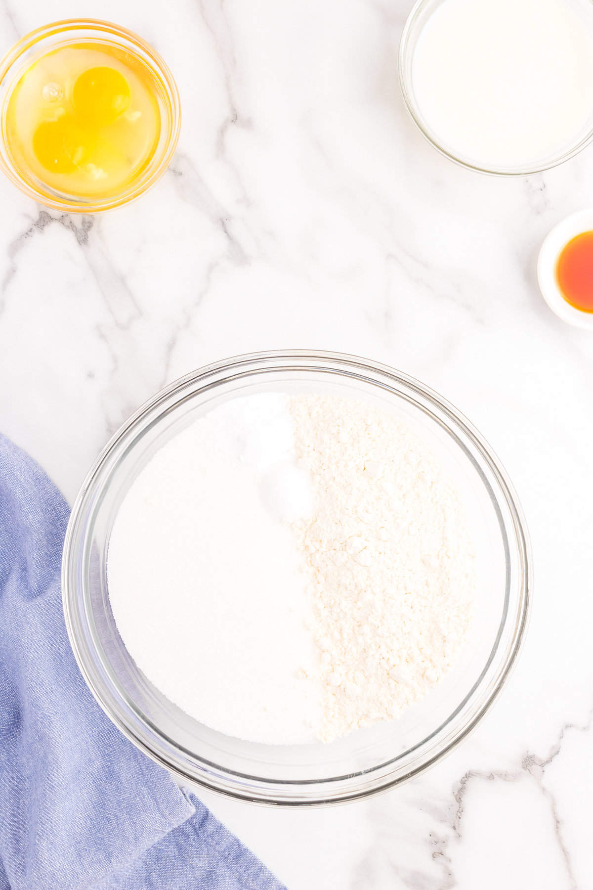 Combining dry ingredients for Texas Sheet Cake recipe in mixing bowl