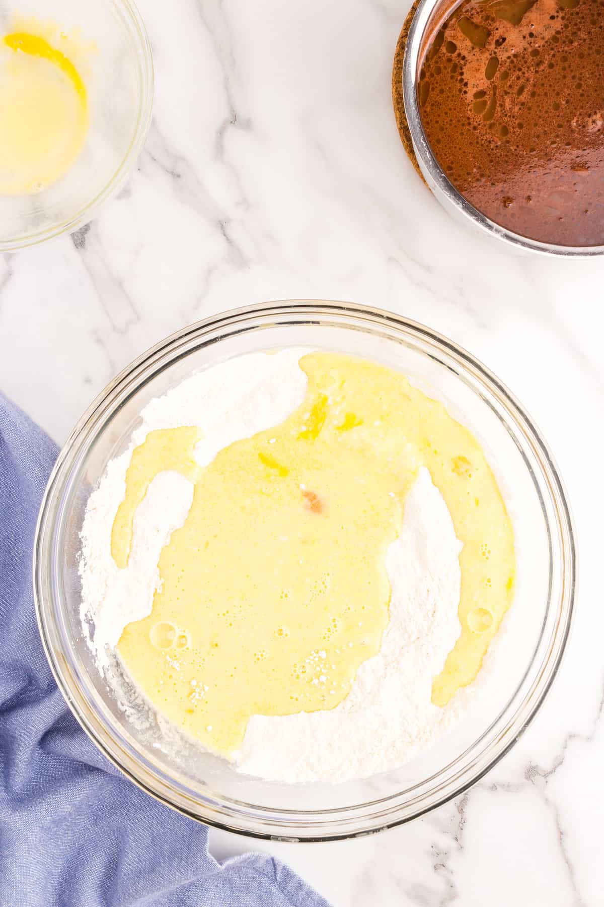 Mixing ingredients for Texas Sheet Cake in bowl