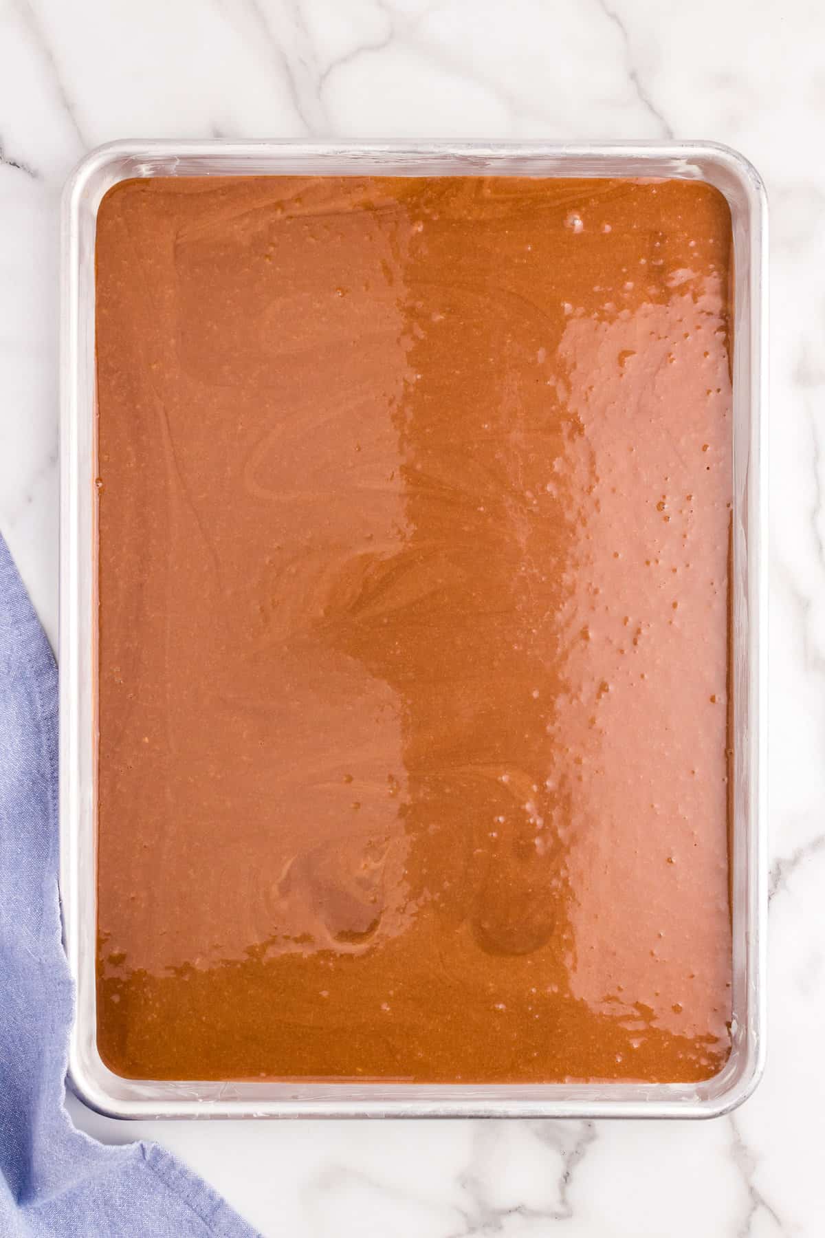 Texas Sheet Cake Batter Poured into Baking Sheet