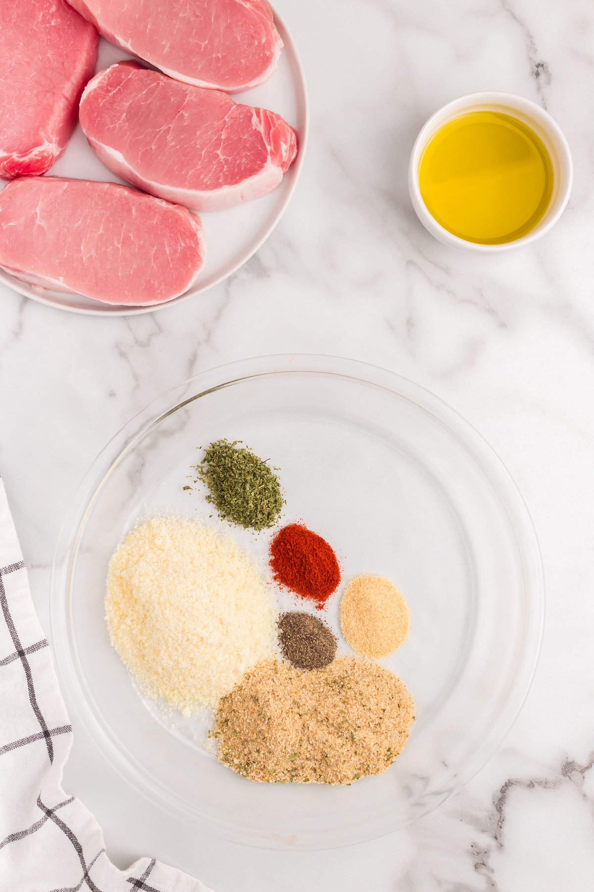 Seasonings for Parmesan Crusted Pork Chops in mixing bowl