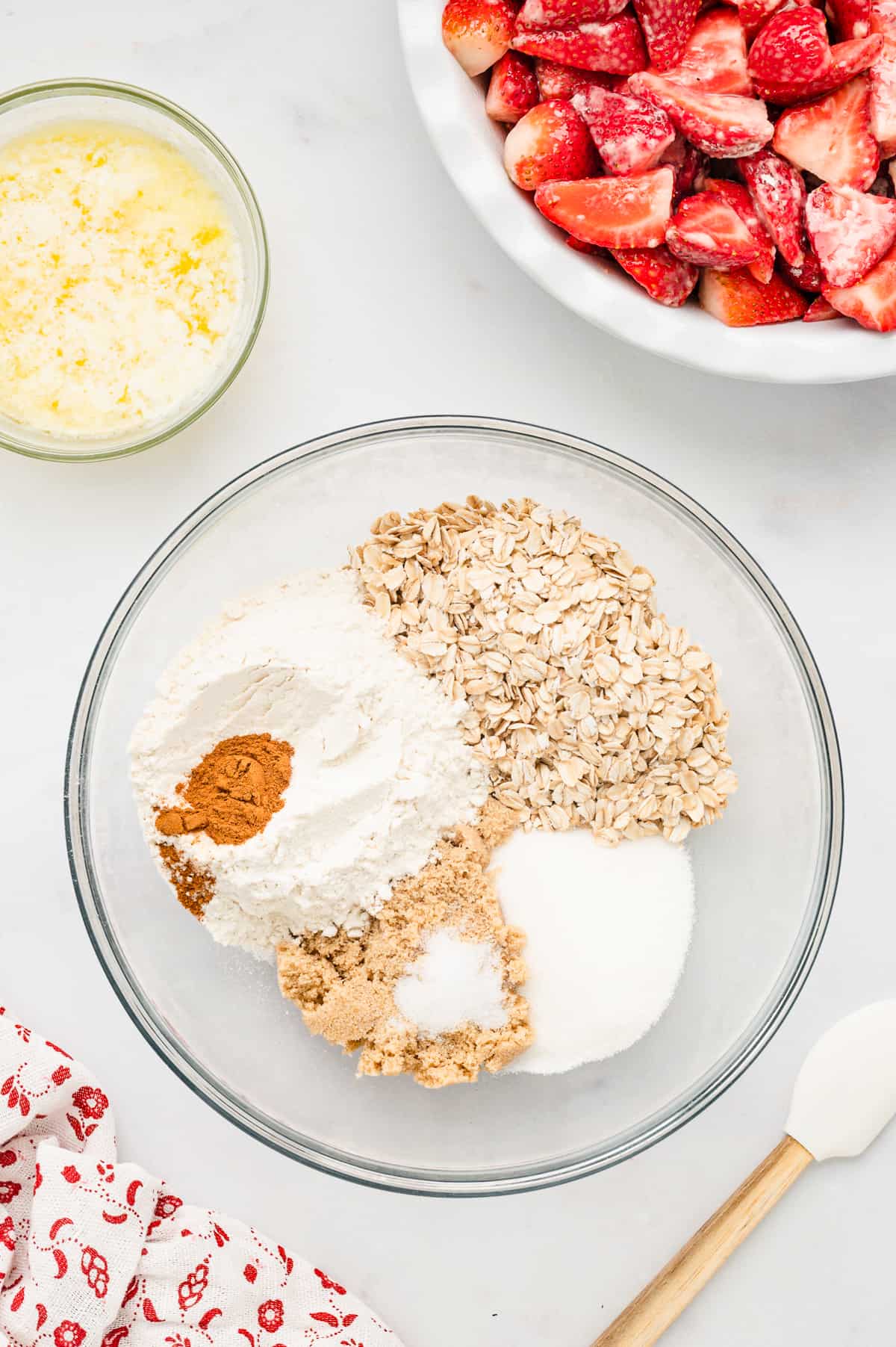 Topping Ingredients for Strawberry Crisp in a Glass Mixing Bowl