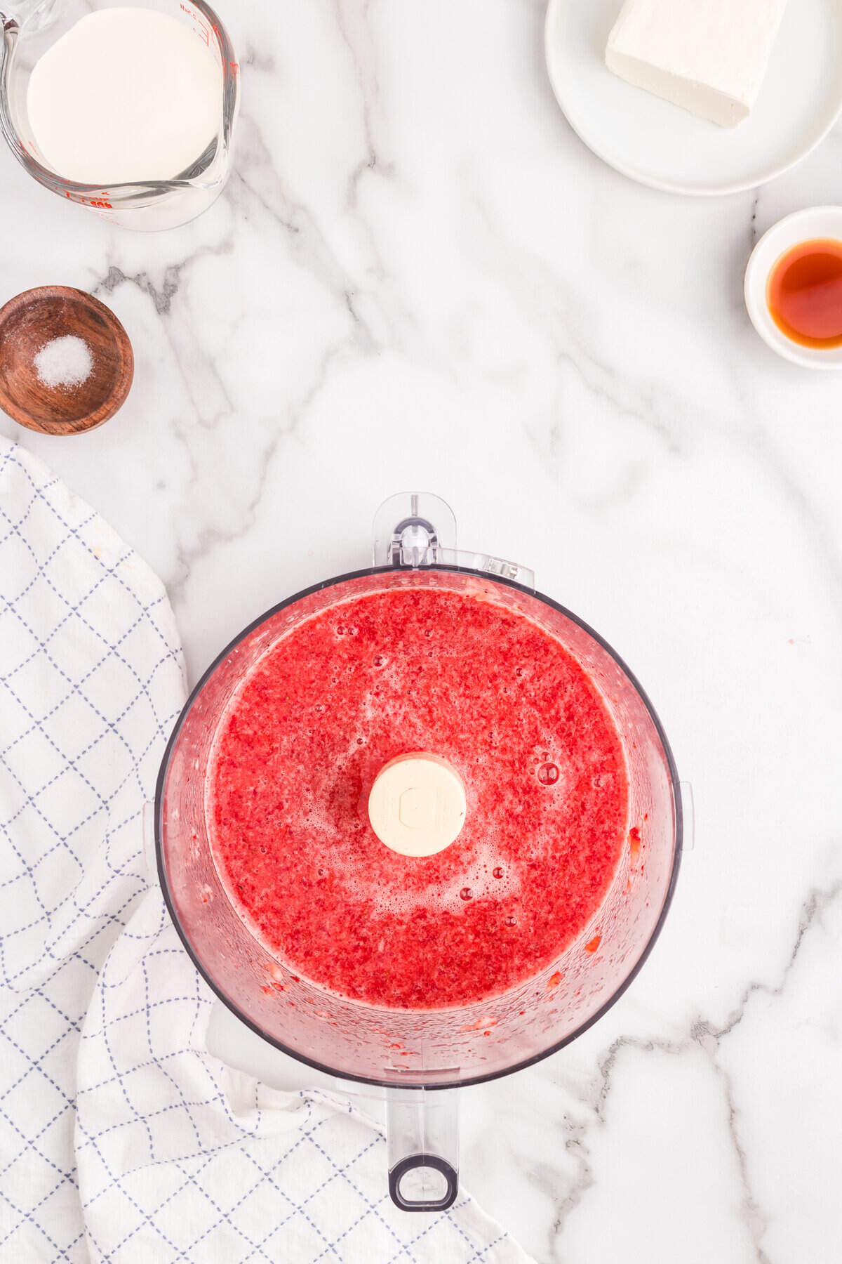 Pureed strawberries in food processor for Strawberry Mousse