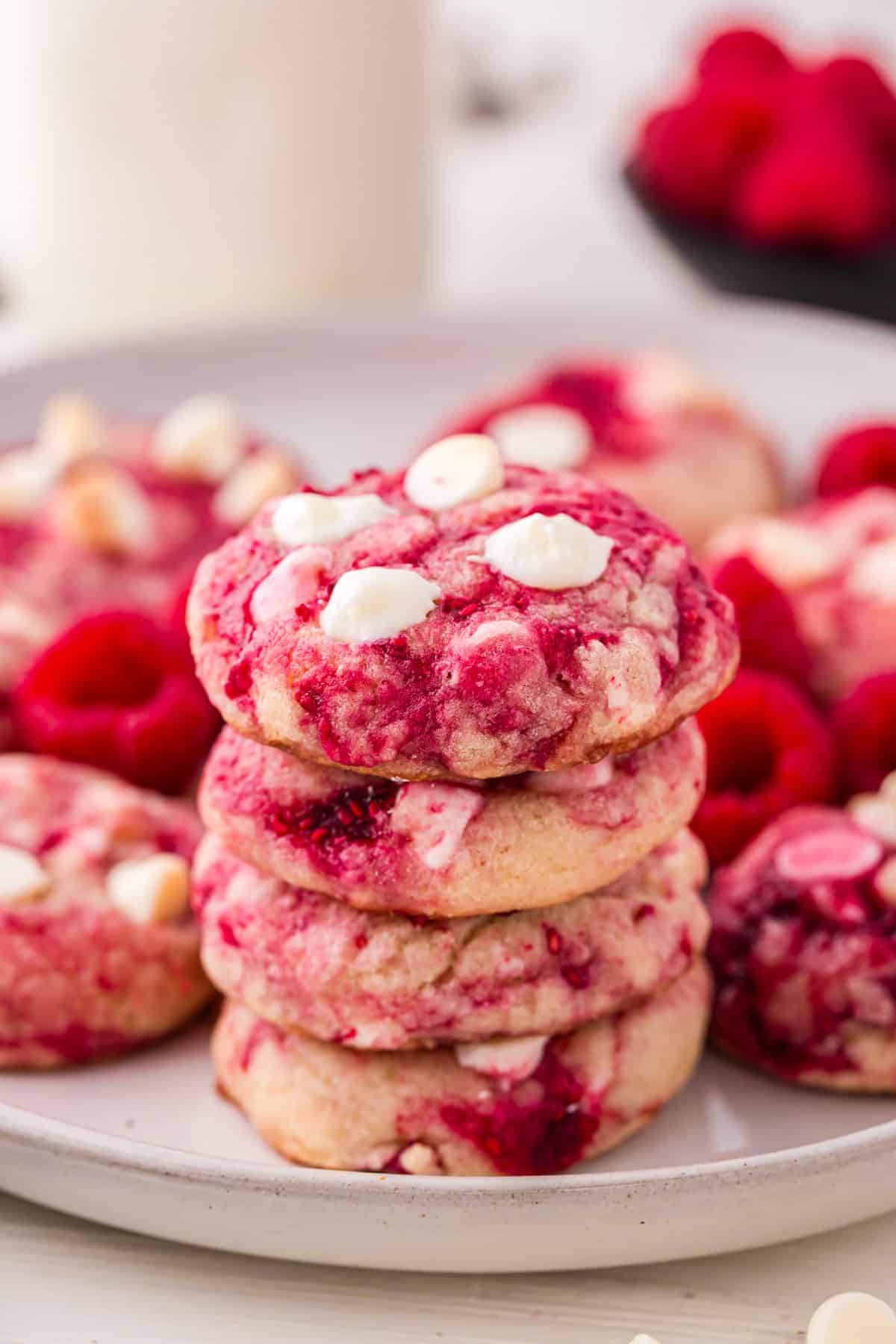 Raspberry White Chocolate Cookies stacked on serving plate