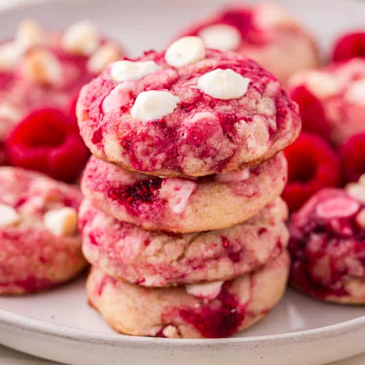 White Chocolate Raspberry Cookies stacked on serving plate