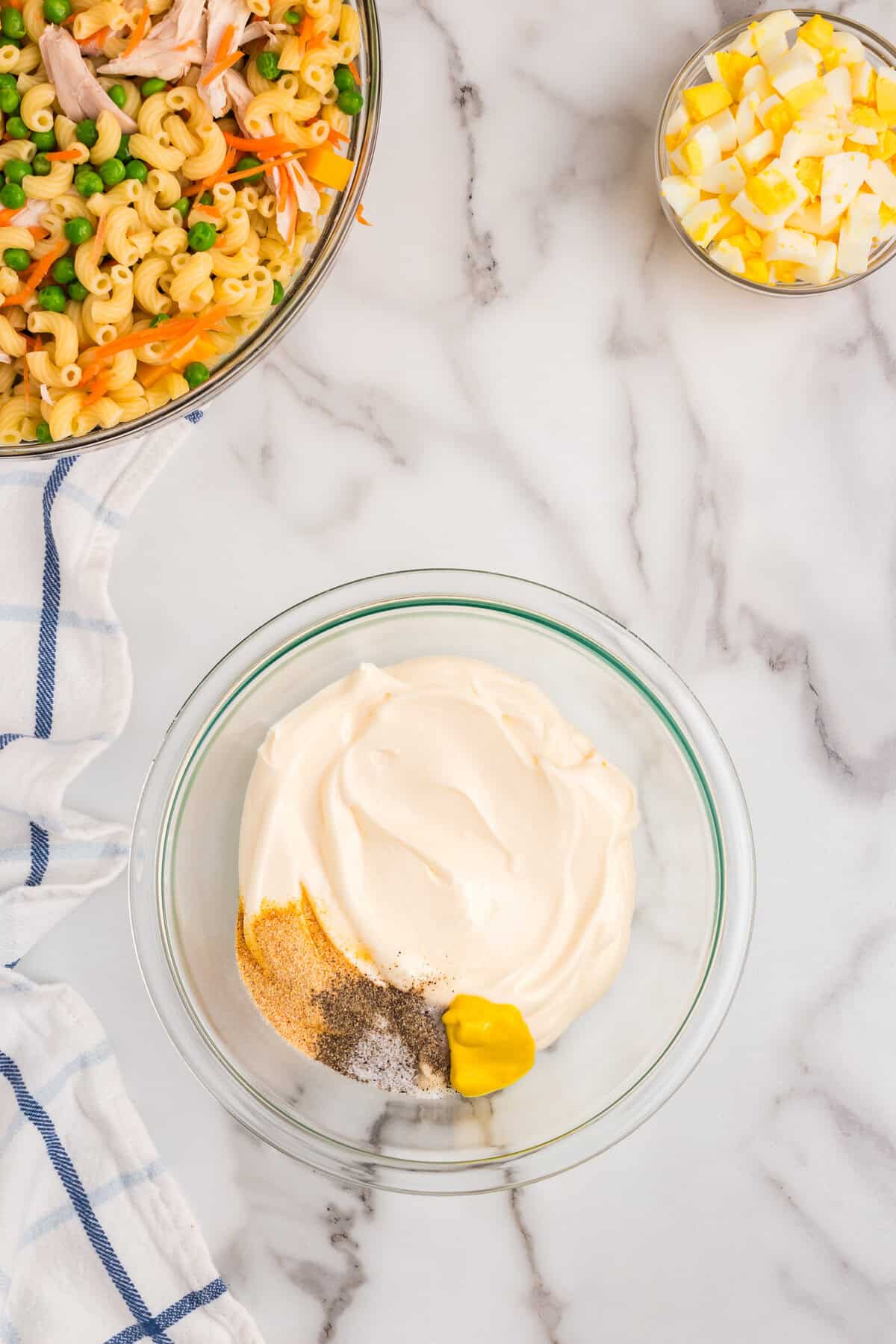 Ingredients for Chicken Macaroni Salad dressing in small mixing bowl