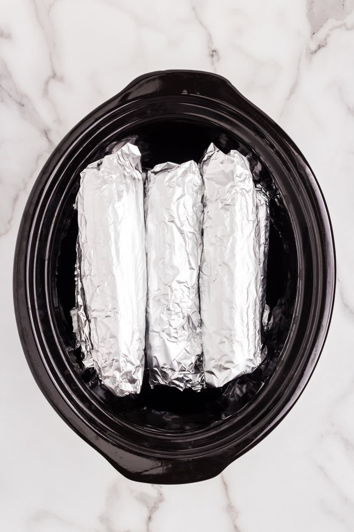 Tinfoil rolled cobs for Crock Pot Corn on the Cob recipe