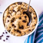 Overhead image of edible cookie dough in white bowl