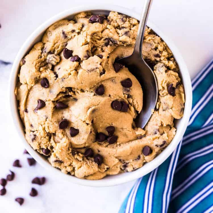 Overhead image of edible cookie dough in white bowl