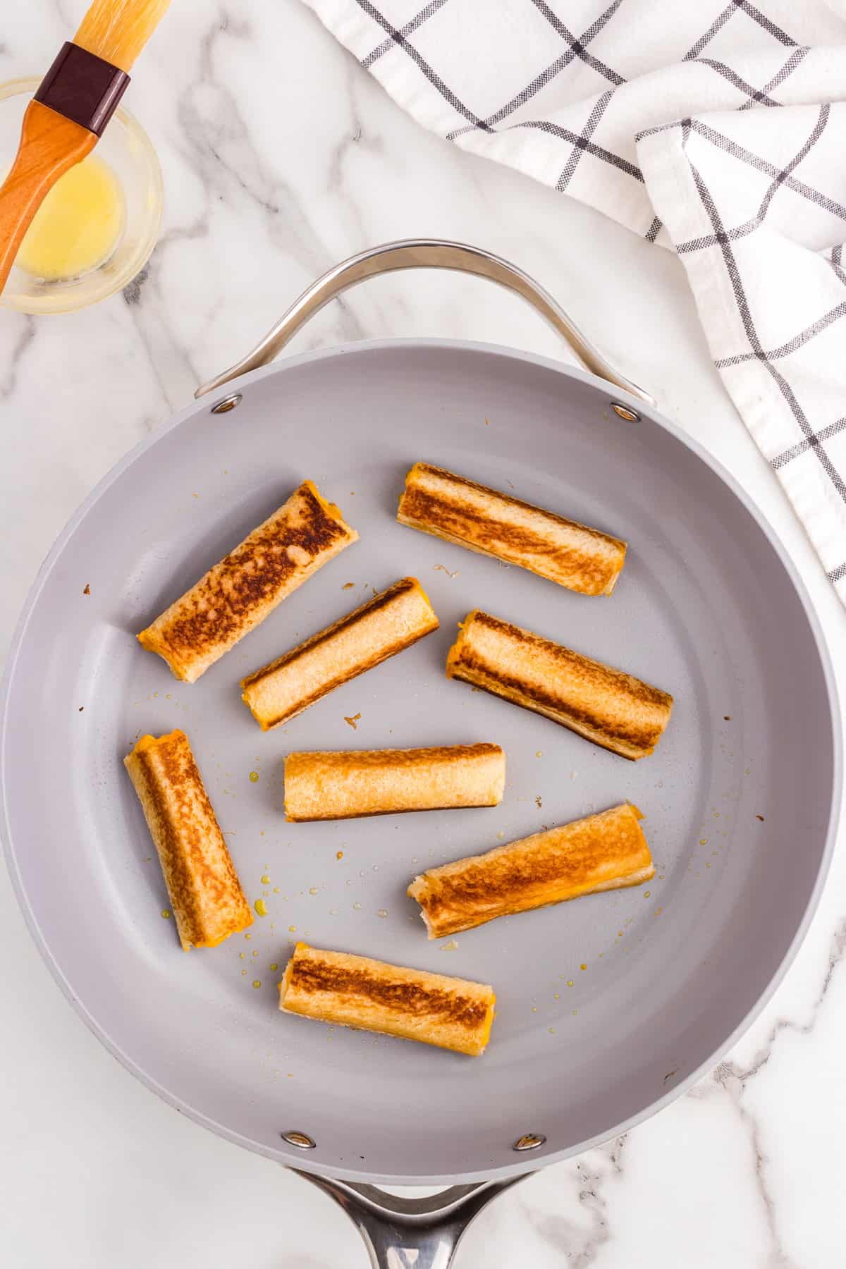 Frequently turn the Roll ups while cooking them on low heat.