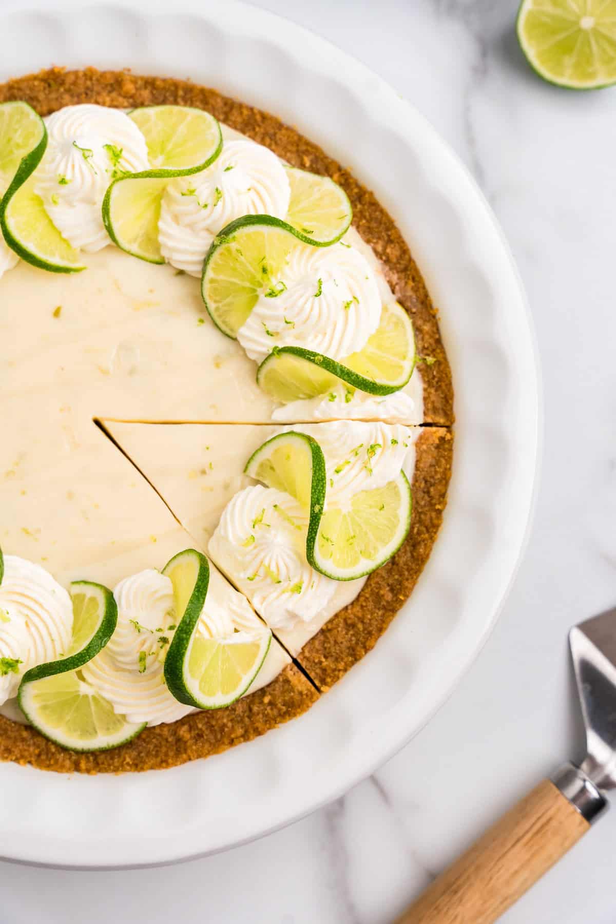 Key Lime Pie slice cut in pie pan