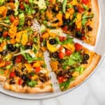 Closeup Square Image of Sliced Taco Pizza