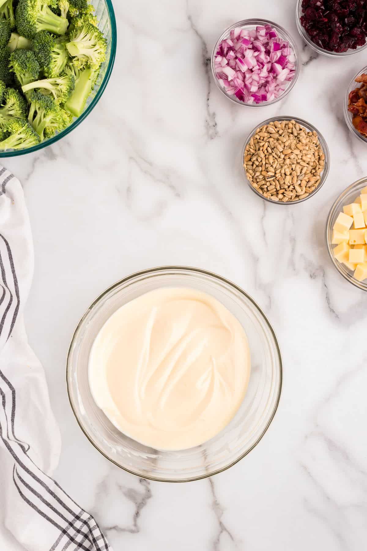 Combined dressing ingredients in small mixing bowl for Broccoli Salad recipe