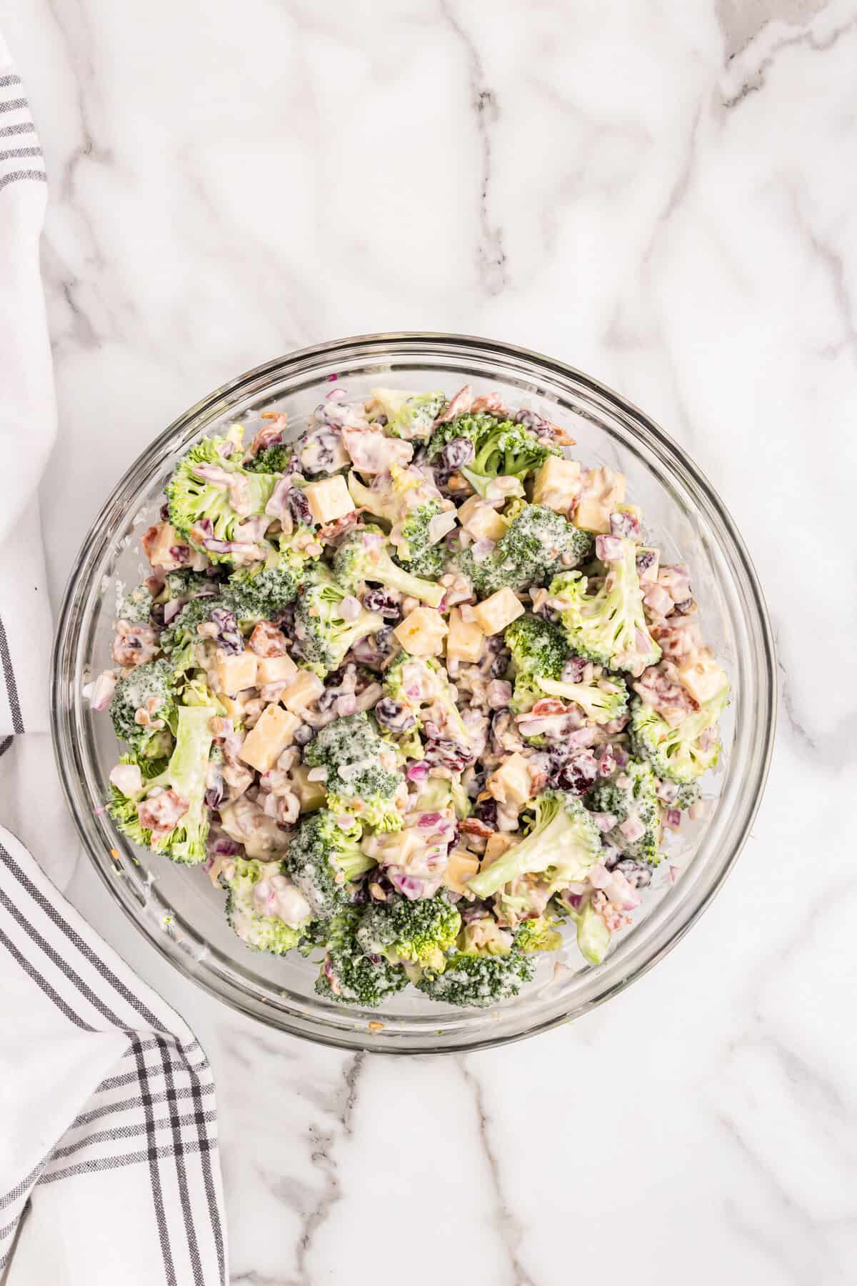 Combined Broccoli Salad ingredients in glass bowl
