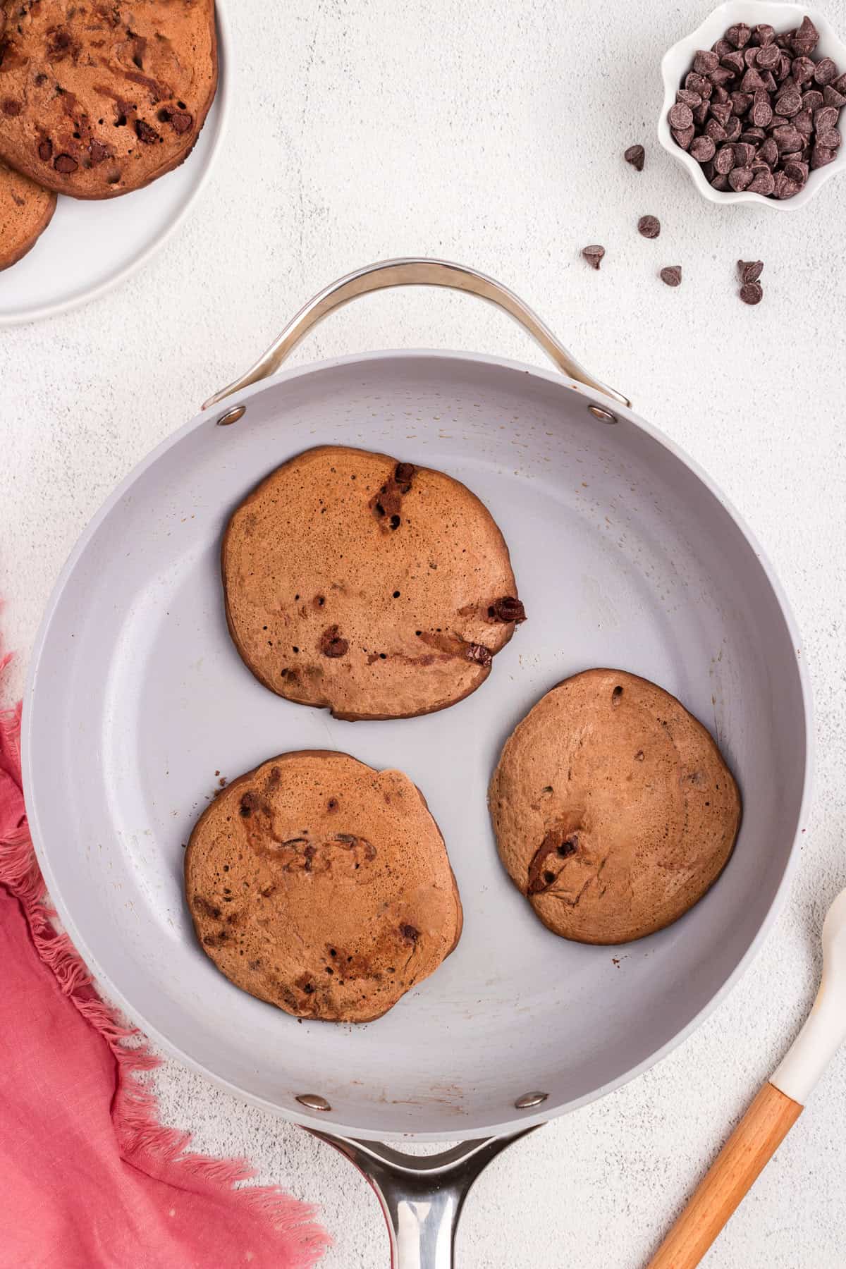 Flipped Chocolate Pancakes in stovetop skillet 