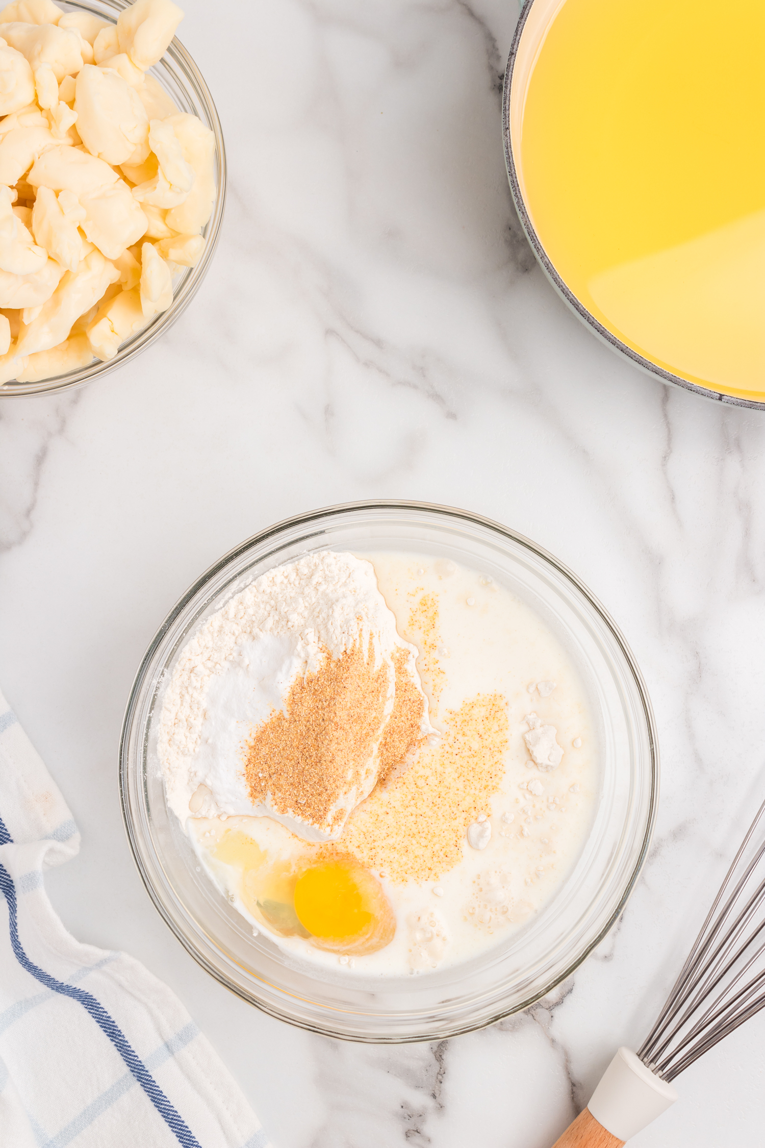 Ingredients for Cheese Curds batter in small mixing bowl