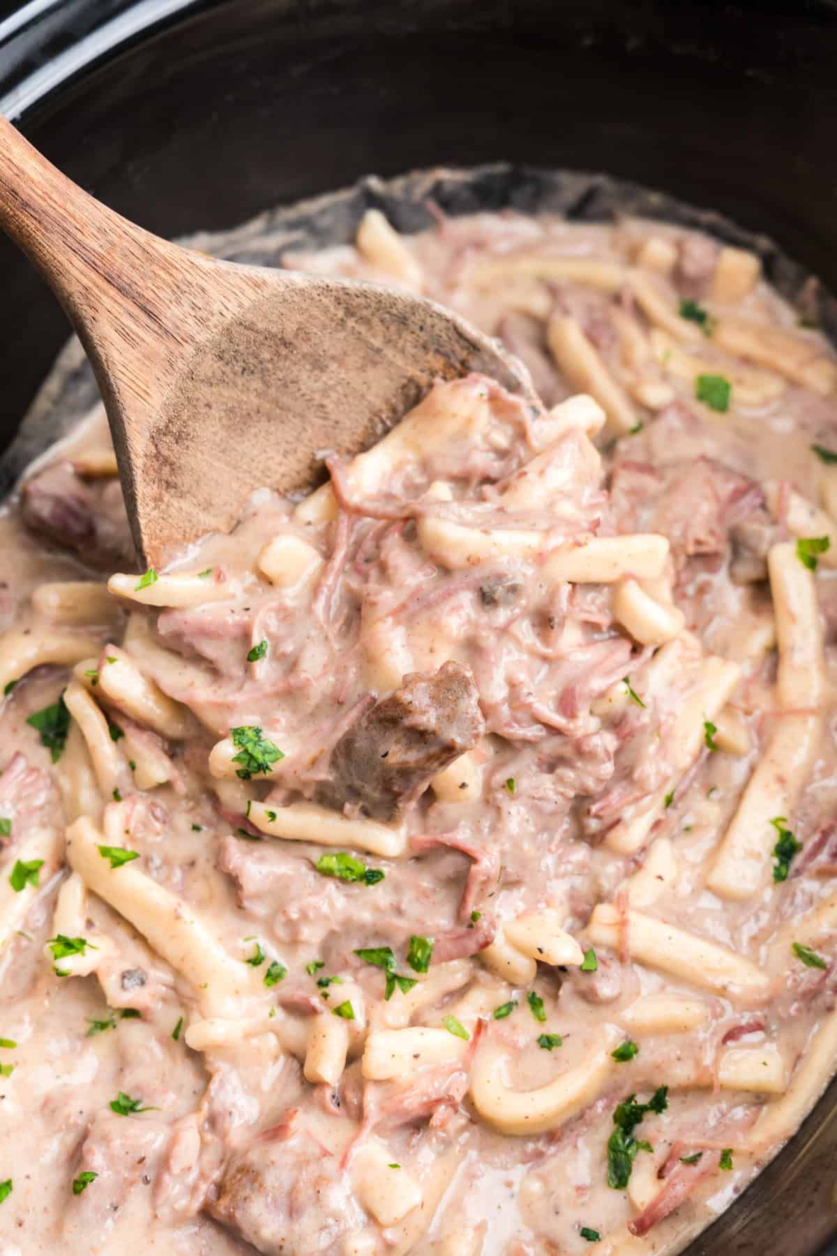 Crock Pot Beef and Noodles in Black Crock Pot