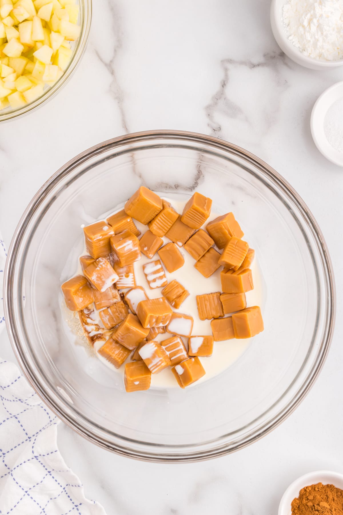 Caramel ingredients in mixing bowl for Salted Caramel Apple Butter Bars