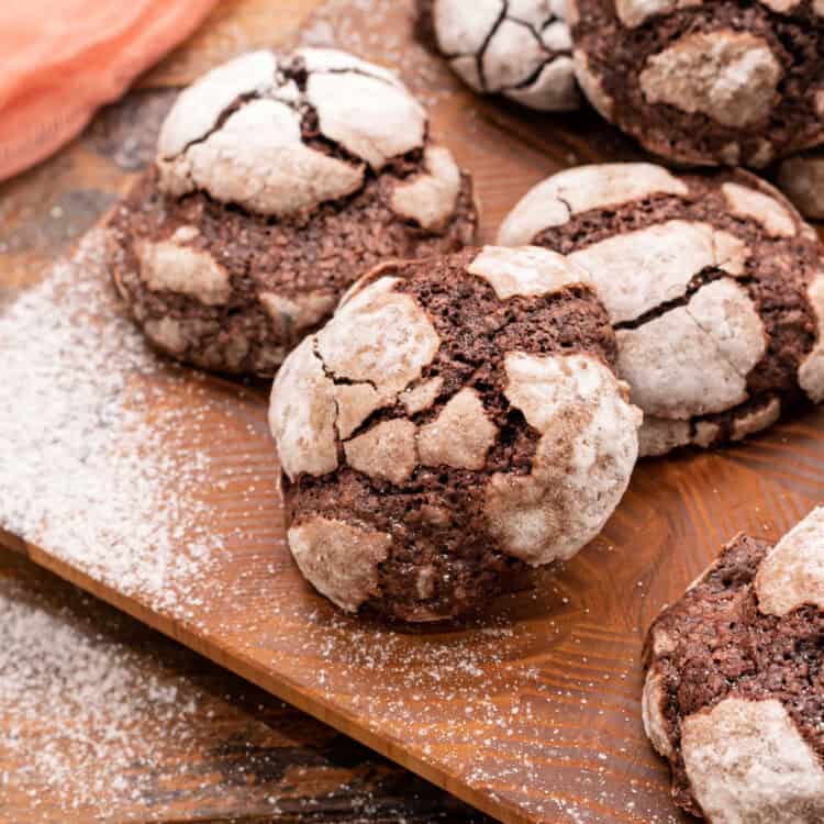Chocolate Crinkle Cookies on wood cutting board