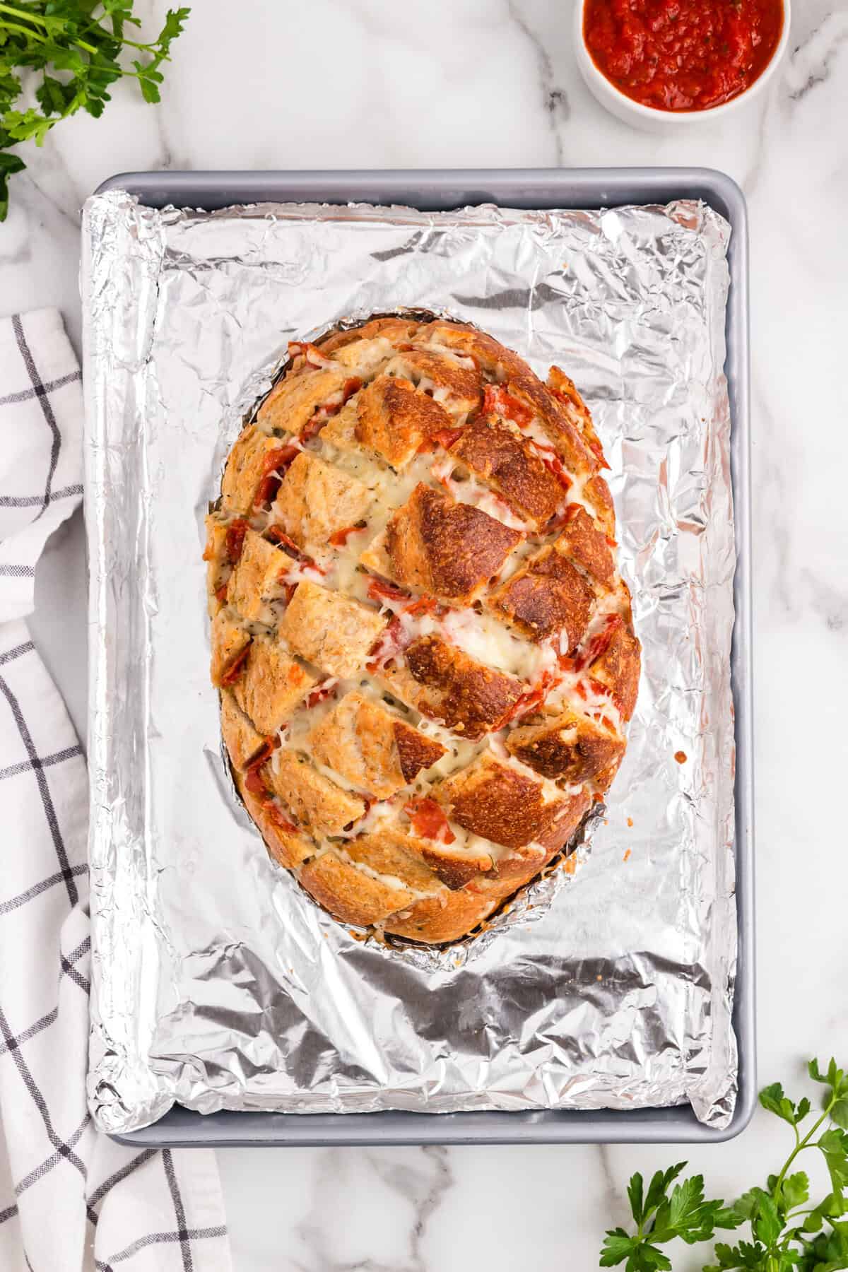 Pull Apart Pizza Bread baked to a golden brown on baking sheet