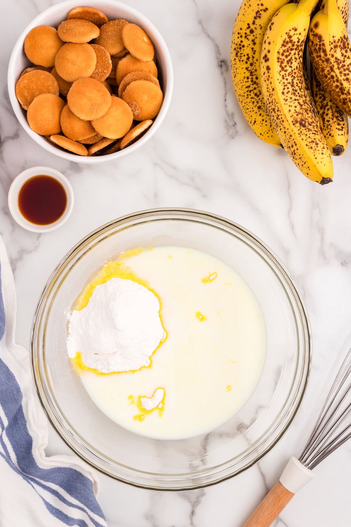 Ingredients for Banana Pudding in glass mixing bowl