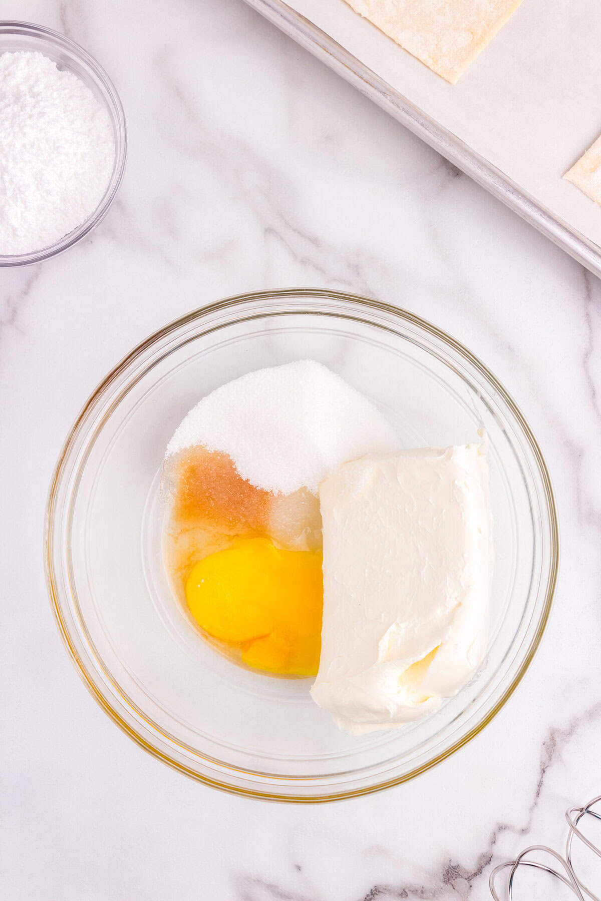 Ingredients for the cream cheese mixture in small glass bowl for  Cream Cheese Danish recipe