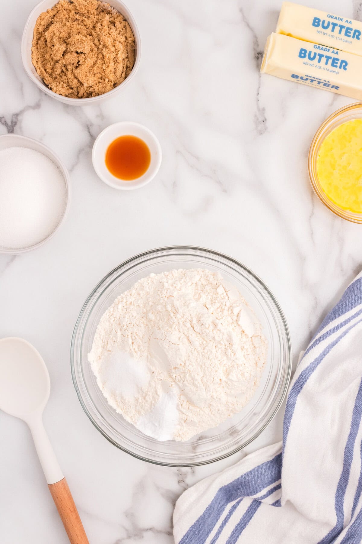 Dry ingredients in glass bowl for White Chocolate Macadamia Nut Cookies