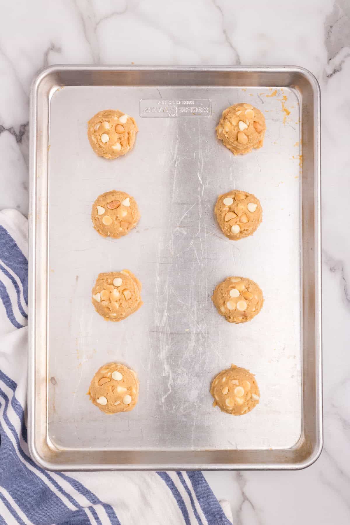 Macadamia Nut and White Chocolate Cookies on baking sheet prior to baking