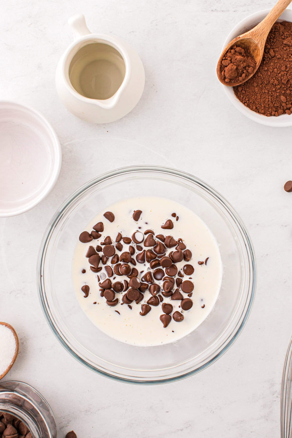 Ingredients for chocolate ganache in mixing bowl for Chocolate Thumbprint Cookies recipe