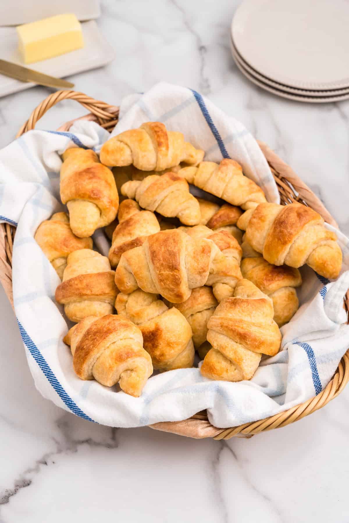 Homemade Crescent Rolls in towel-lined basket