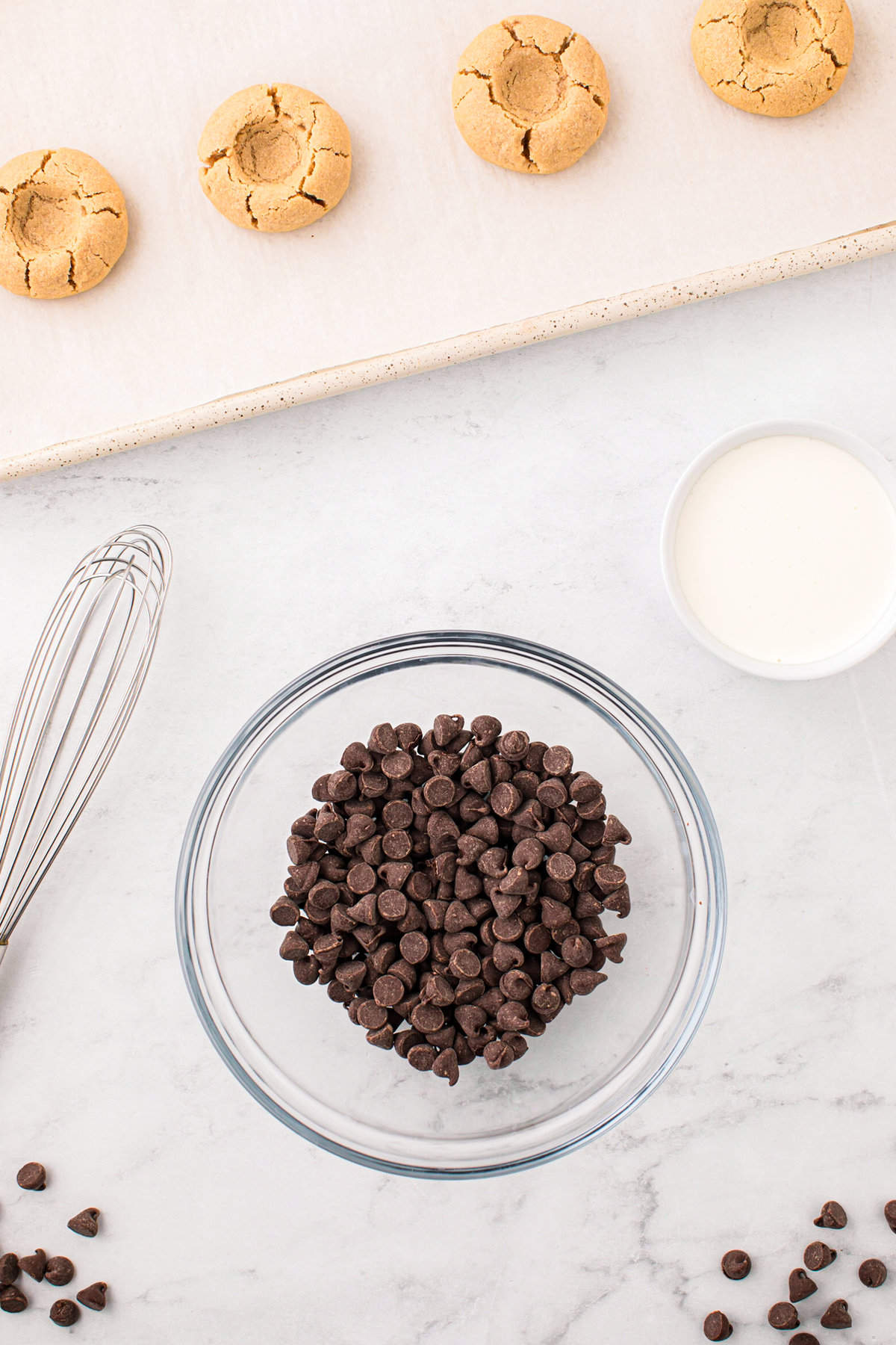 Chocolate chips in small bowl for ganache for the  Peanut Butter Thumbprint Cookies recipe