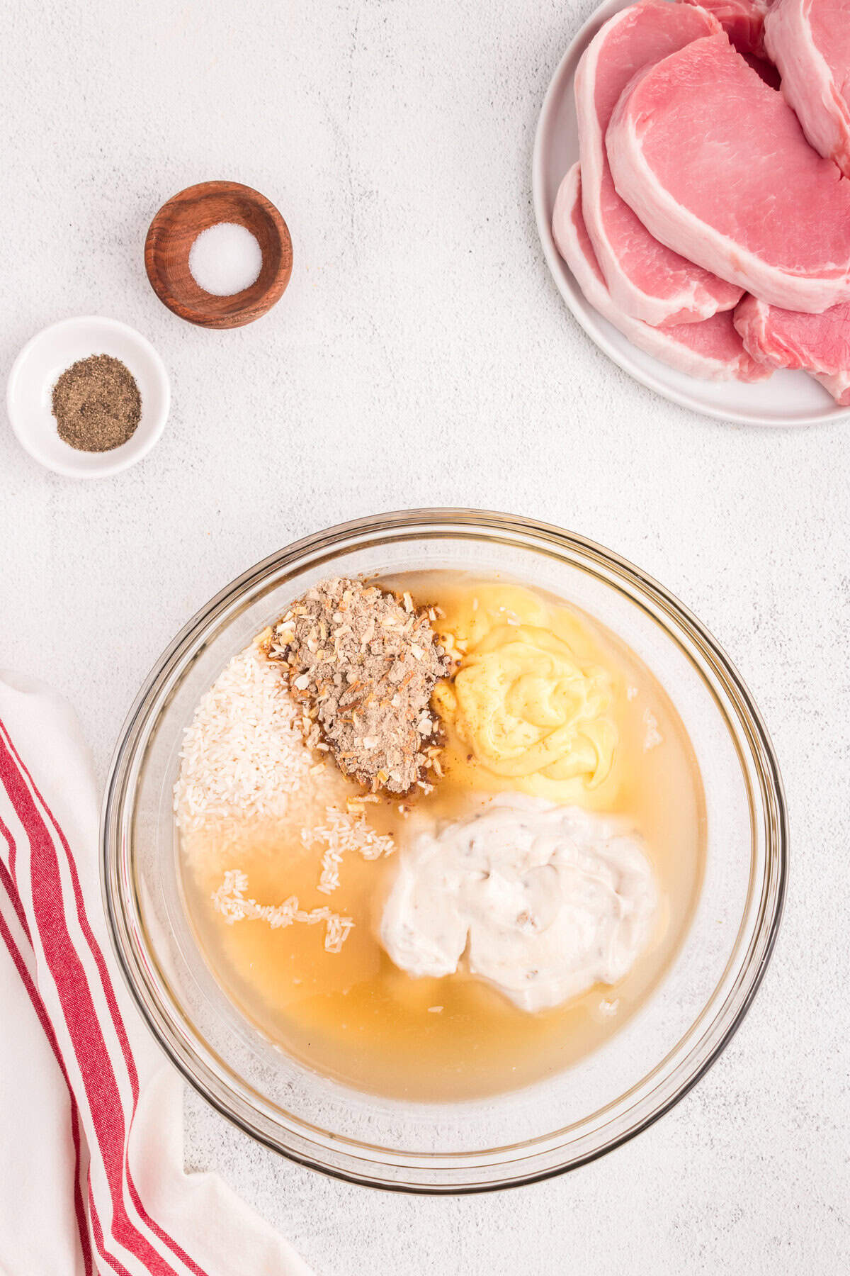 Ingredients for Baked Pork Chops and Rice in mixing bowl