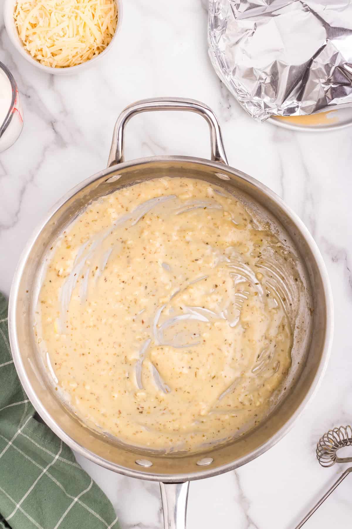 Overhead picture of roux mixture in a metal pan.
