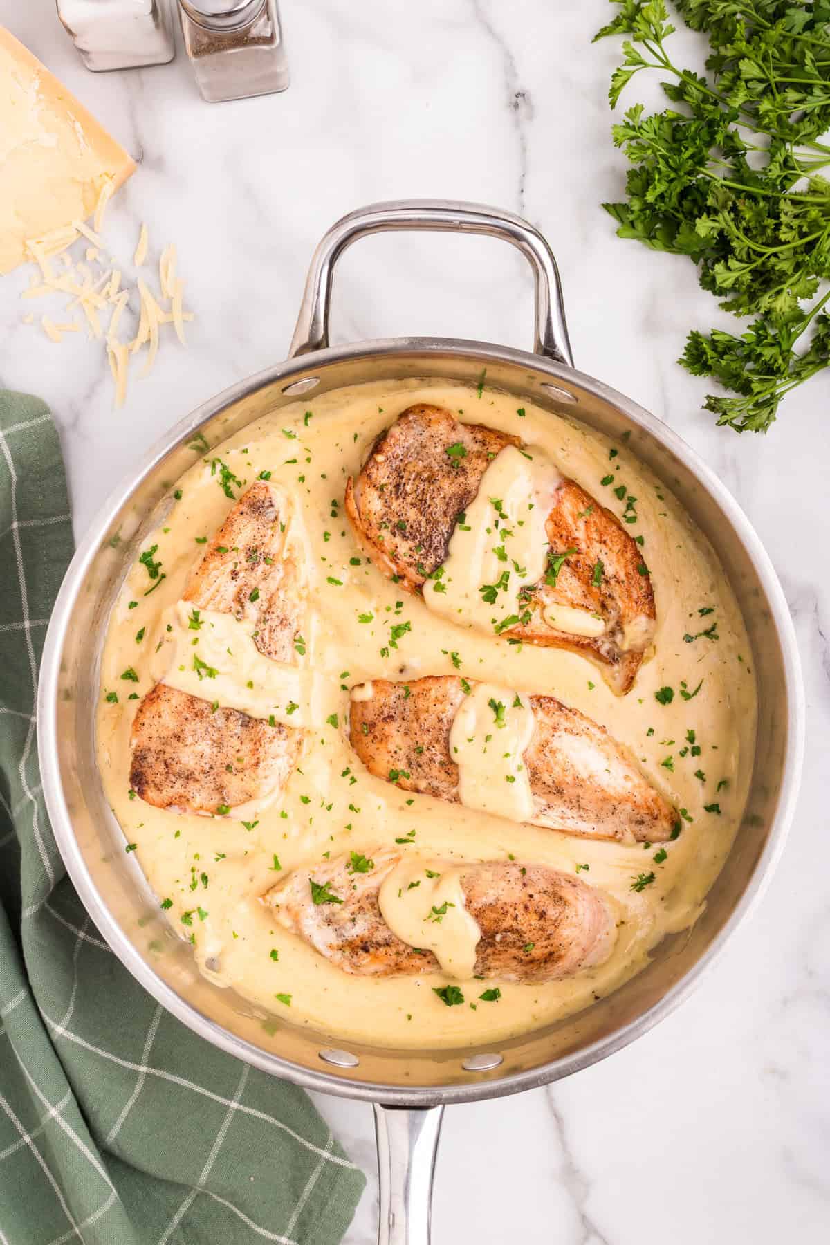 Overhead picture of completed Garlic Parmesan Chicken in a metal pan.
