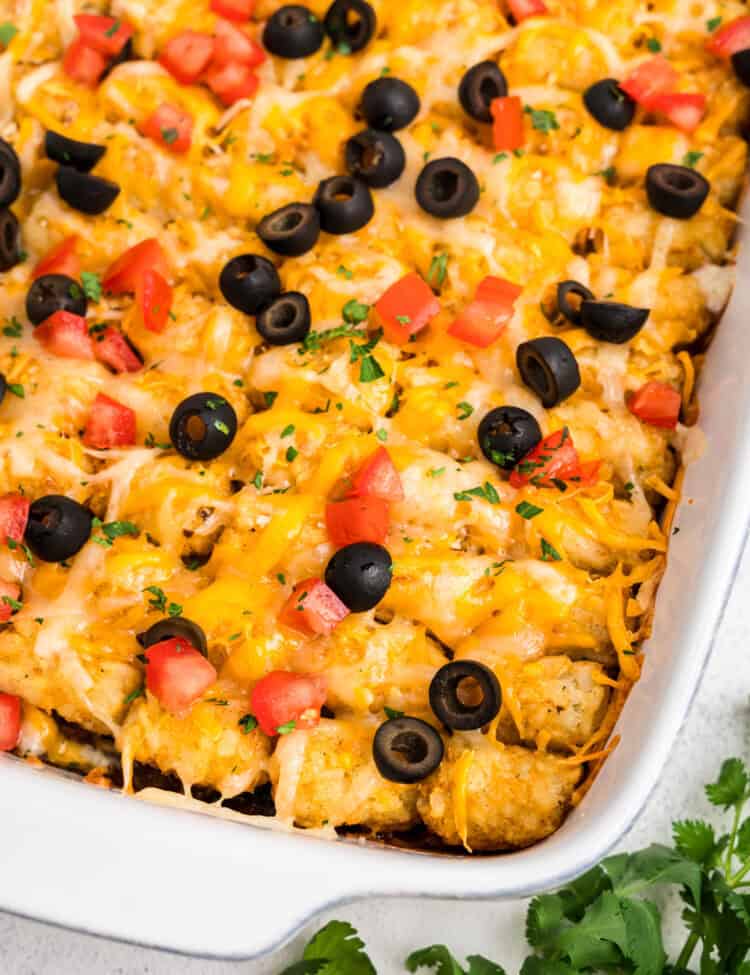 Mexican Tater Tot Casserole in a white casserole dish