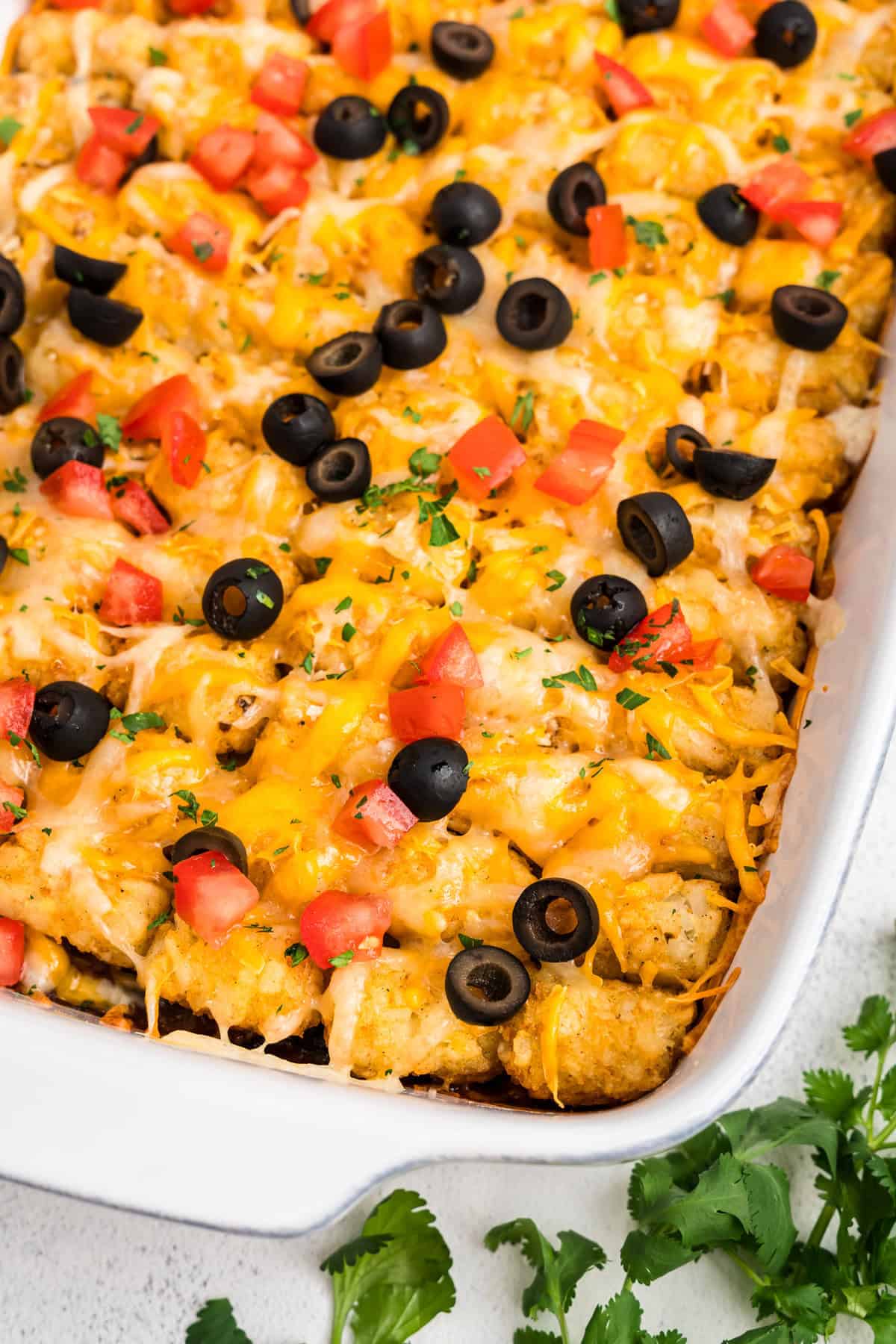 Mexican Tater Tot Casserole in a white casserole dish