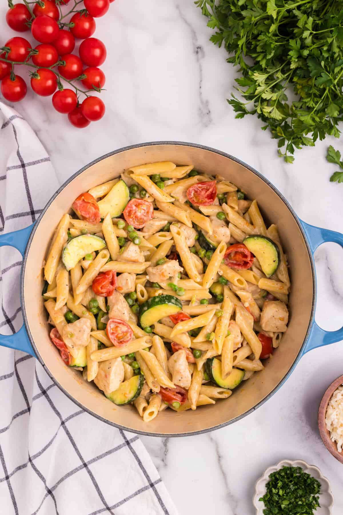 Overhead picture of chicken primavera in a pot.