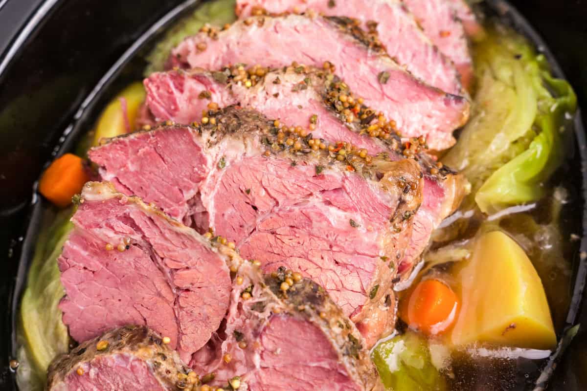 Close up picture of completed corned beef and cabbage in the crock pot.