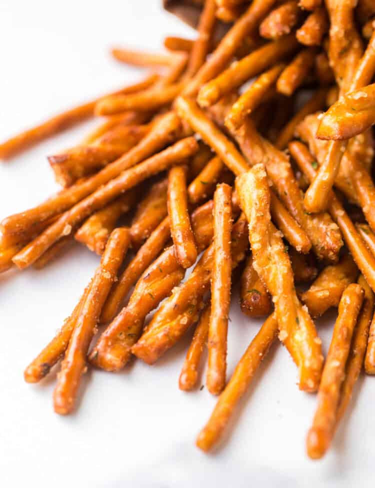 Close up of ranch pretzels on white background
