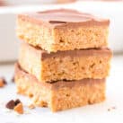Scotcheroo Bars cut into squares and stacked three high